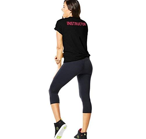 STRONG by Zumba Fitness Camiseta Unisex Transpirable de Diseño Gráfico Ropa Hombre y Mujer, Back to Black, XS/S